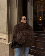 Manteau duveteux en fausse fourrure mongole